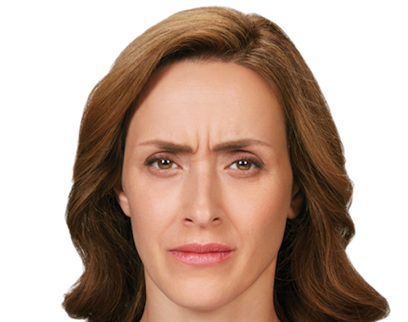 Woman with facial wrinkles and expression lines, showcasing the natural signs of aging.